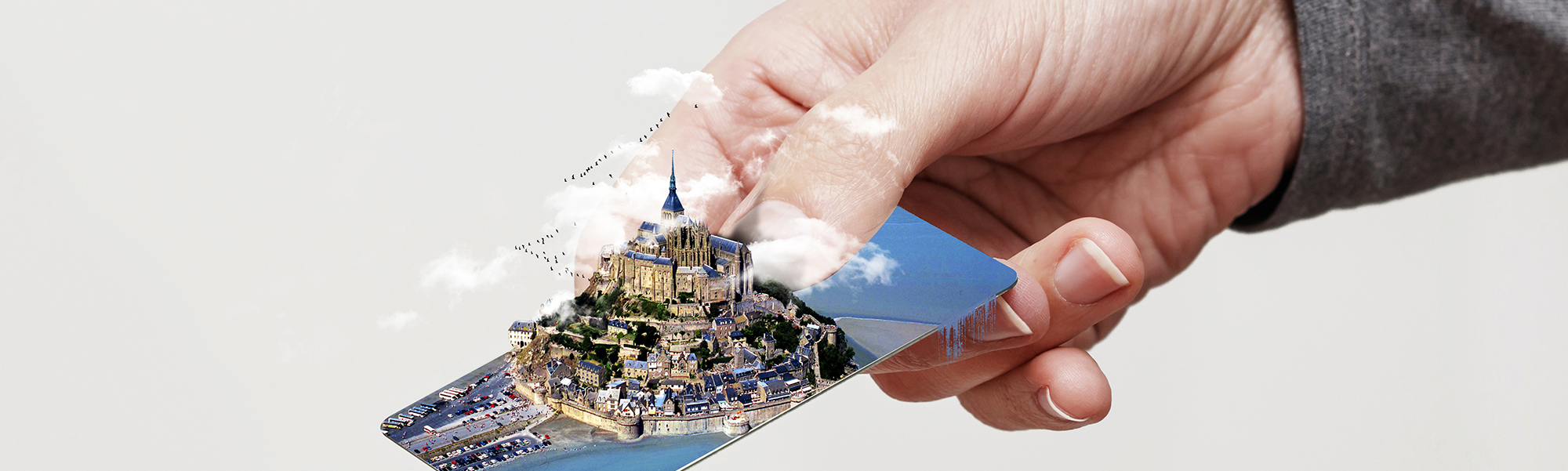 Woman’s hand holding out an anonymous credit card